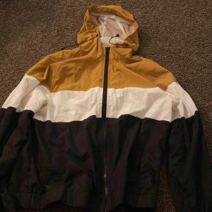 yellow, white & black windbreaker